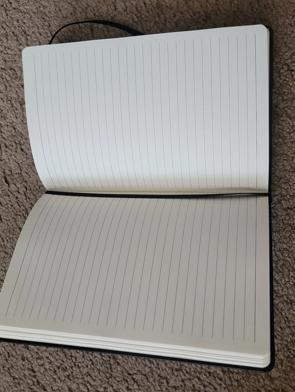 Varsity Spirit Black Embossed Elastic-Band Notebook